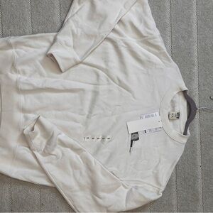 Uniqlo White Sweatshirt with Subtle Graphic